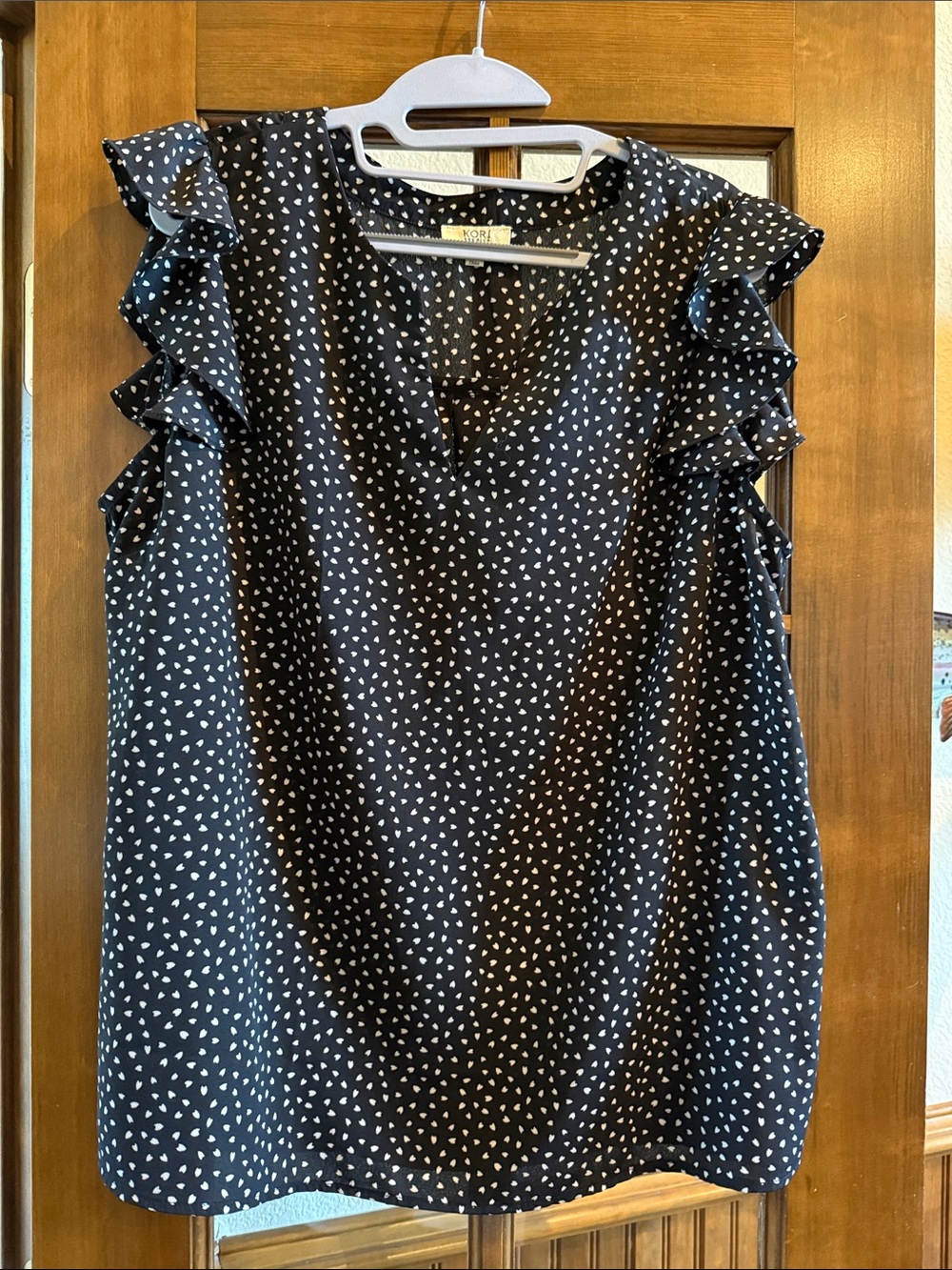 Kori Black Sleeveless Heart-Print Ruffle Top